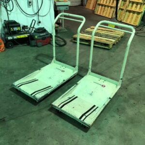 Used Lasermax Roll Systems Roll Cart 18 paper roll carts lined up before cleaning
